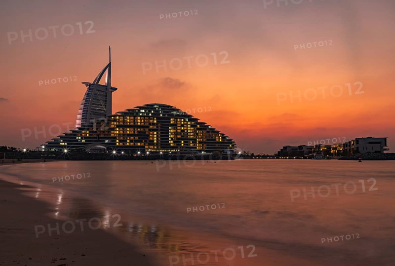 A picture of the Jumeirah Public Beach, the Jumeirah Marsa Al Arab Hotel and the Burj Al Arab Hotel, at sunset