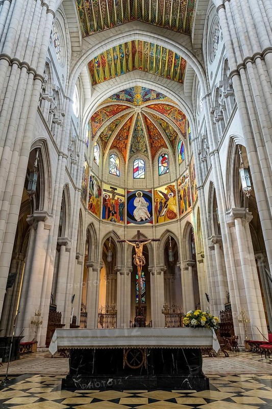 Almudena Cathedral: Iconic seat of Madrid's Archdiocese, built over a century, consecrated in 1993, adjacent to the Royal Palace
