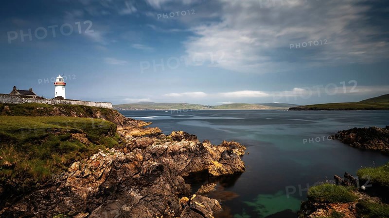 A view of the historic Broadhaven Lighthouse on the Mullet Peninsula in County Mayo in Ireland