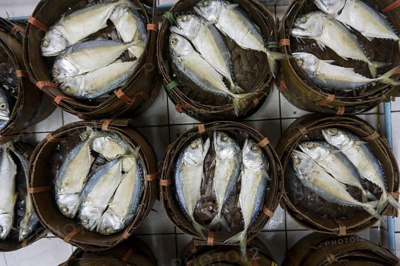 Mackerel fish in bamboo basket at market, Thailand, Asia