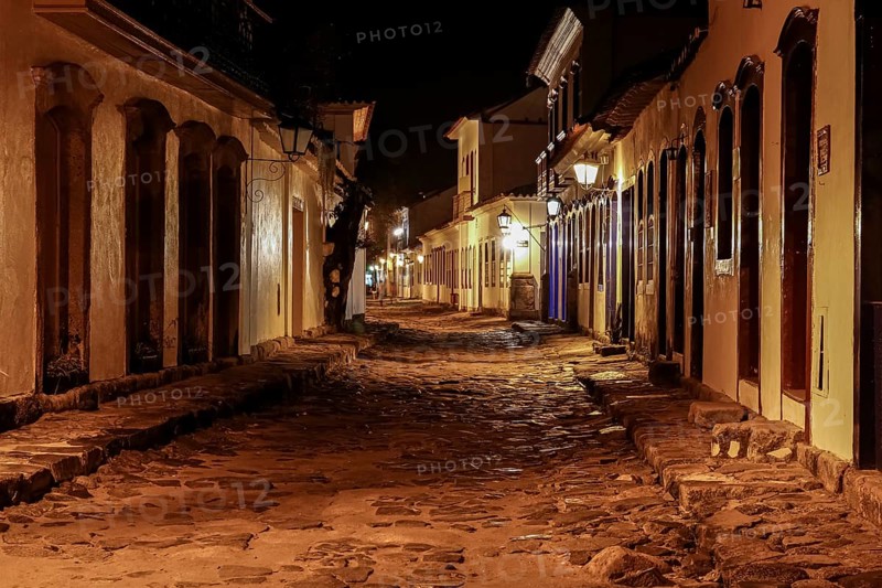 Atmospheric night view of illuminated street and buildings in historical center of Paraty, Brazil, Unesco World Heritage, South America