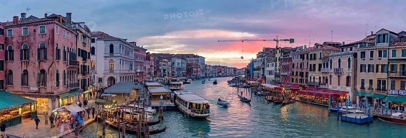 The Grand Canal with gondola and vaporetto at sunset time, Venice, Italy, Europe