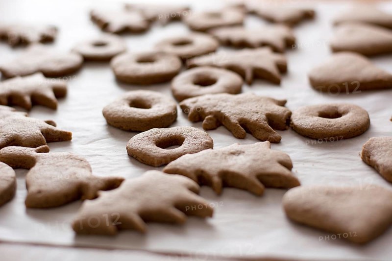 Baked easter gingerbread cookies on the white plate Closeup shot with selective focus