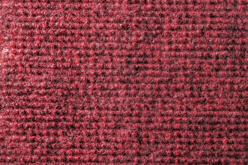 Red kitchen sponge texture vertical view