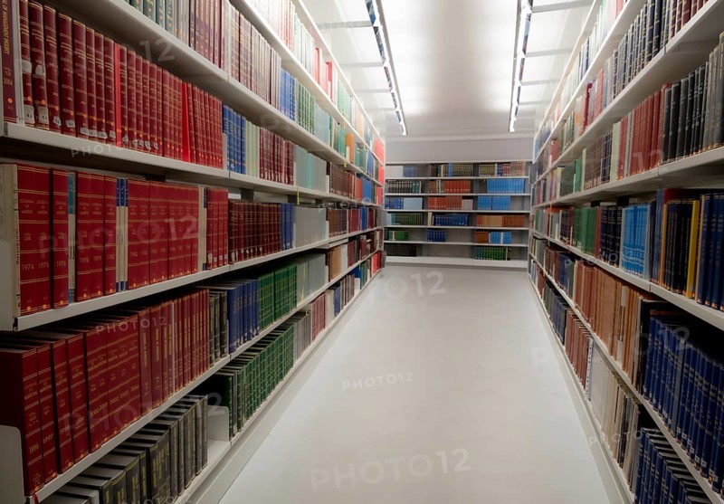 Stack of various information Books for study on a University library bookshelf