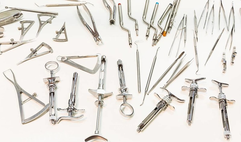 Dental instruments for stomatology practice. Tweezer, carver, wiper, drill, pincers, scraper, remover