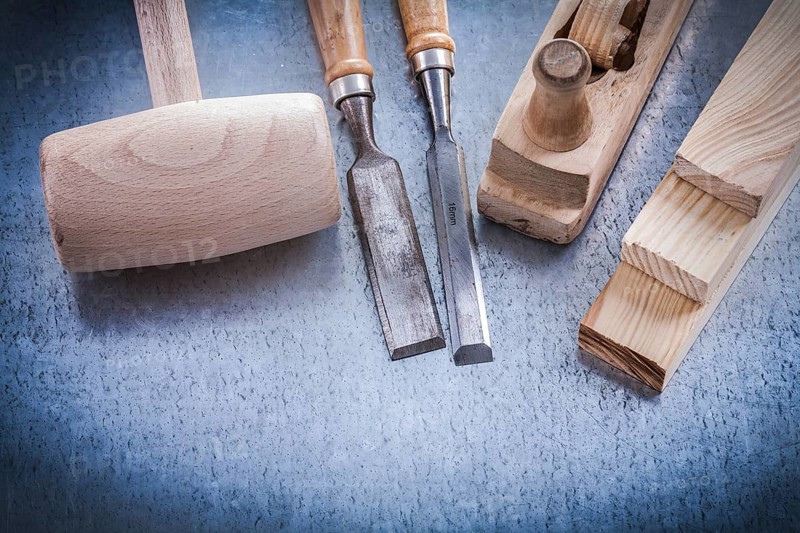 Composition of joiner's tools on metallic background construction concept