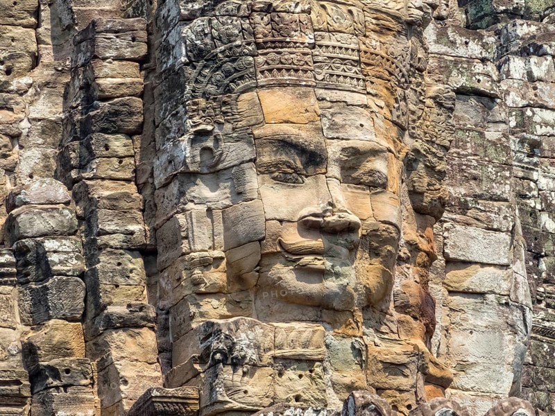 One of many stone faces of Angkor Thom, Siem Reap, Cambodia, Asia