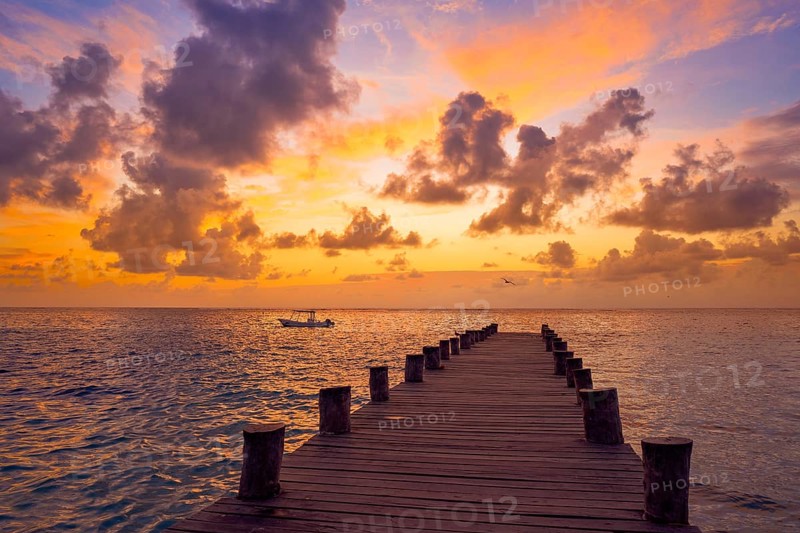Riviera Maya pier sunrise in Caribbean Mayan Mexico