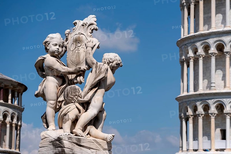Sculpture at the cathedral and famous leaning tower of Pisa, Italy, Europe