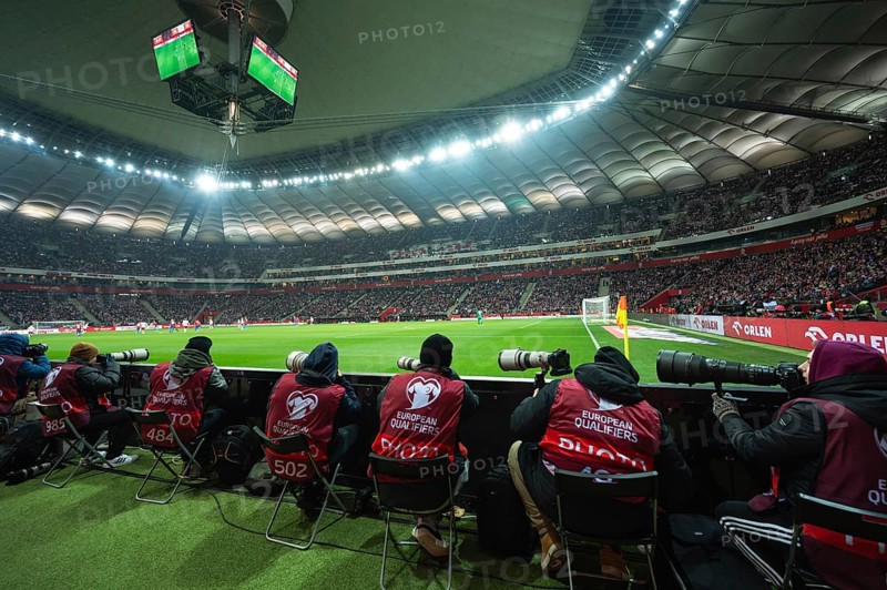 WARSAW, POLAND - NOVEMBER 17, 2023: Qualifications for UEFA Euro 2024. Match Poland - Czech Republic 1:1. Photographers behind touche line of the field