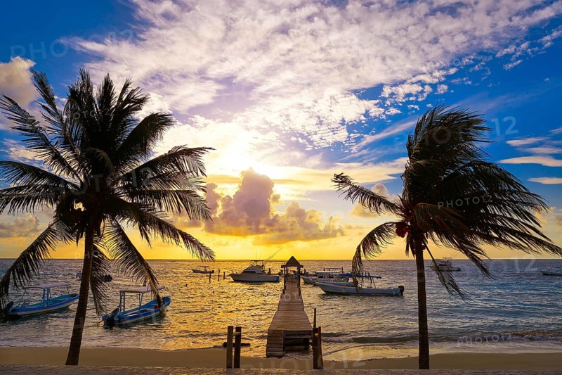 Riviera Maya sunrise pier in Caribbean Mayan Mexico