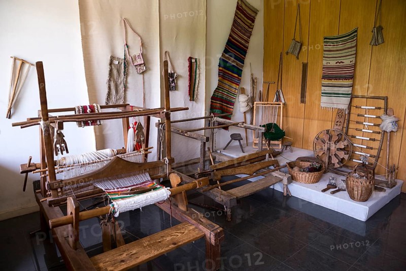 Weaving equipment for Carpets. Traditional colorful carpets from Bulgaria. Hand-woven (hand-made) carpets with different elements and colours. Ethnic and folk patterns