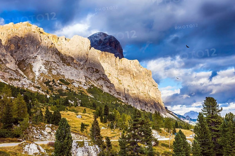 Travel in the Dolomites. Falzarego pass. Approaching snowstorm. The concept of active and adventure tourism