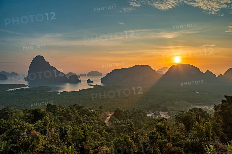Tropical islands sunrise view at Samed Nang Chee viewpoint with bay to sea ocean, Phang Nga Thailand nature landscape