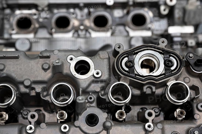 Close up of the engine (motor) of a powerful car. Metallic