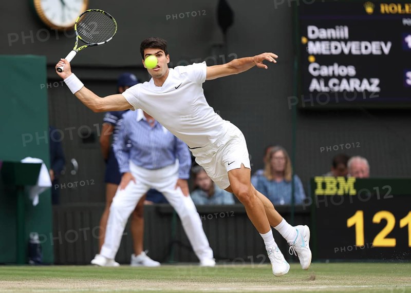 Spanish tennis player Carlos Alcaraz in action at the 2024 Wimbledon Championships, London, England, United Kingdom, Europe