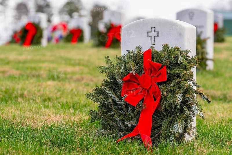 Atop a hill, a veterans cemetery with white headstones and the American flag evokes deep honour, sacrifice, and enduring national pride, Salisbury, United States of America