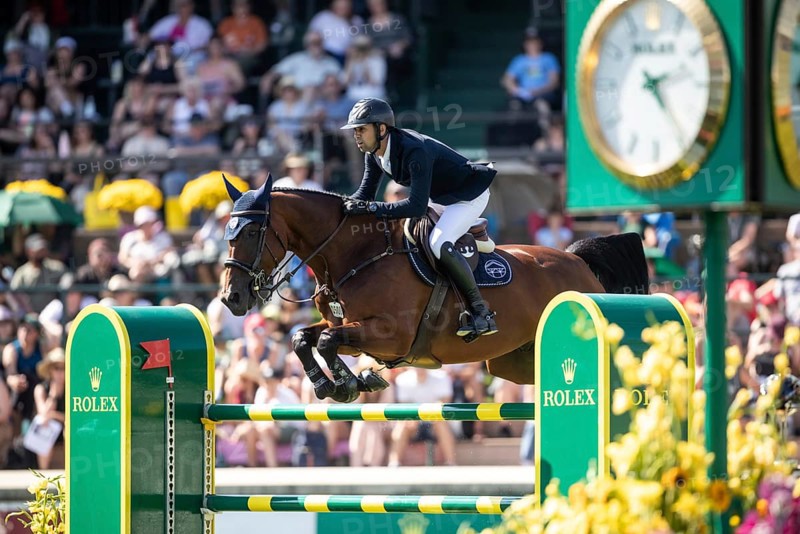 Nayel Nassar of Egypt and riding Capital Night Star compete in the first round of the 1.60m CPKC International during the Spruce Meadows Masters, presented by Rolex, in Calgary, Alberta, Canada, North America