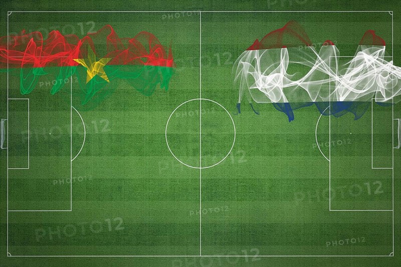 Burkina Faso vs Netherlands Soccer Match, national colors, national flags, soccer field, football game, Competition concept, Copy space