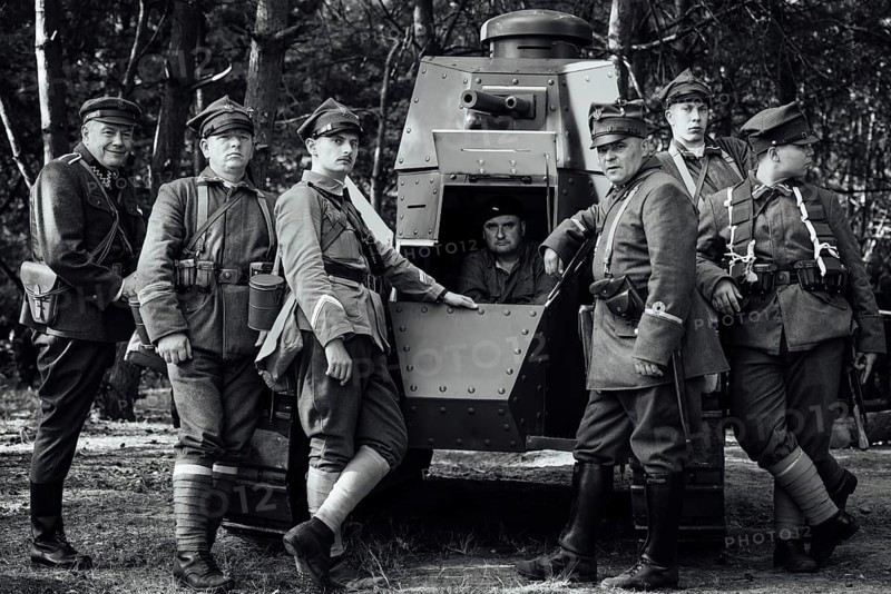 LUBIN, POLAND - AUGUST 8, 2020:, A staging of the Battle of Warsaw from 1920, in which the Polish army defeated the Bolshevik aggression. Polish soldiers and the Tank Renault FT-17