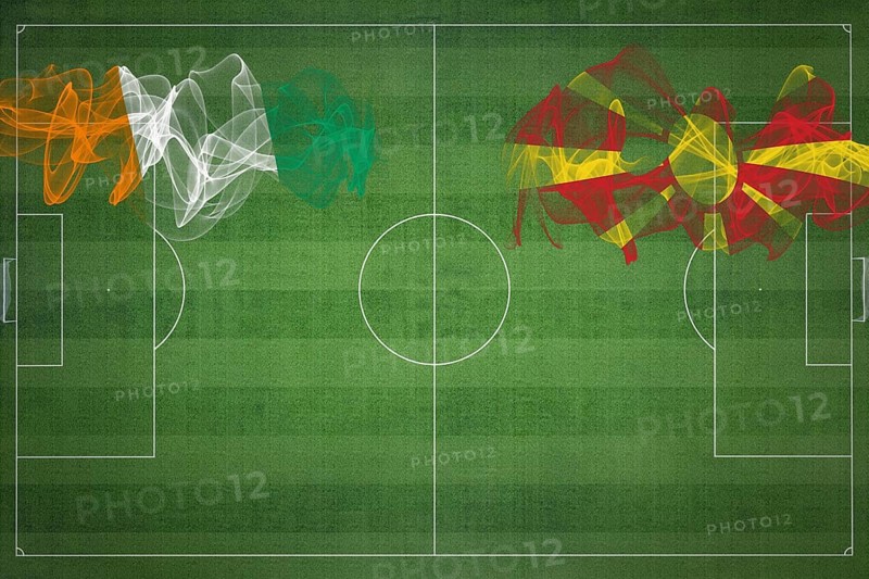 Ivory Coast vs North Macedonia Soccer Match, national colors, national flags, soccer field, football game, Competition concept, Copy space