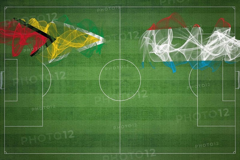 Guyana vs Luxembourg Soccer Match, national colors, national flags, soccer field, football game, Competition concept, Copy space