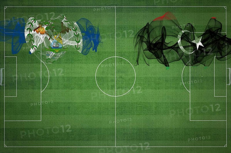 Belize vs Libya Soccer Match, national colors, national flags, soccer field, football game, Competition concept, Copy space