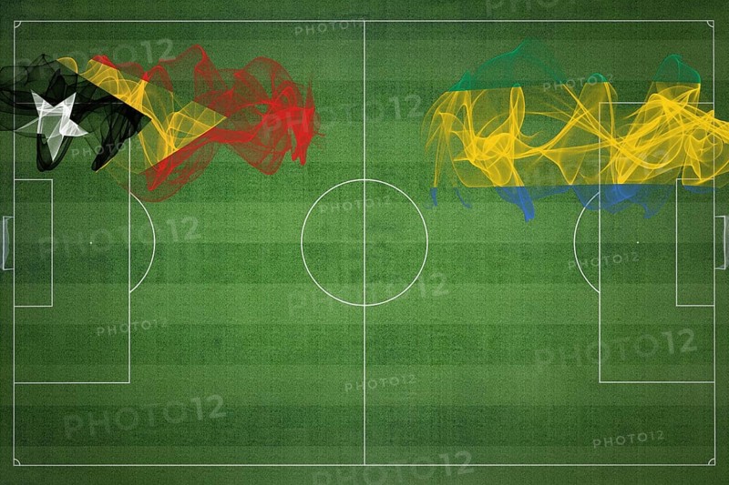 East Timor vs Gabon Soccer Match, national colors, national flags, soccer field, football game, Competition concept, Copy space