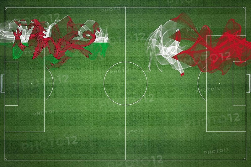Wales vs Bahrain Soccer Match, national colors, national flags, soccer field, football game, Competition concept, Copy space