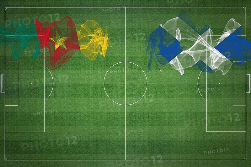 Cameroon vs Scotland Soccer Match, national colors, national flags, soccer field, football game, Competition concept, Copy space