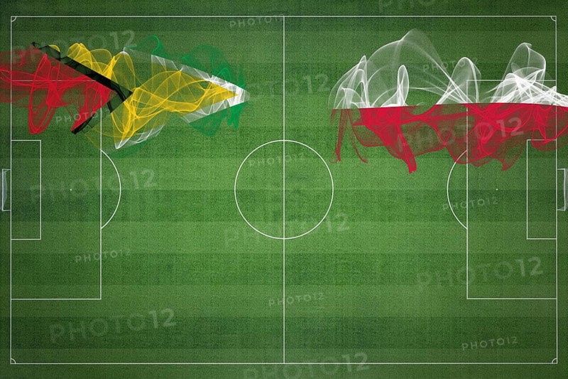 Guyana vs Poland Soccer Match, national colors, national flags, soccer field, football game, Competition concept, Copy space