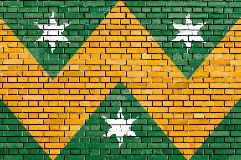 Flag of Wadhurst painted on brick wall
