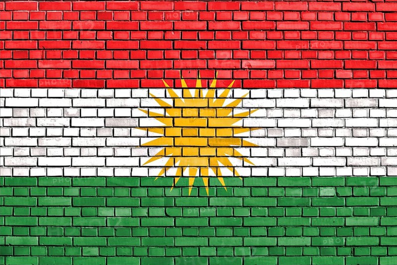 Flag of Kurdistan painted on brick wall