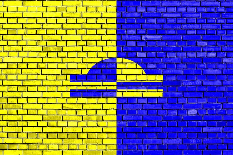 Flag of Ede painted on brick wall