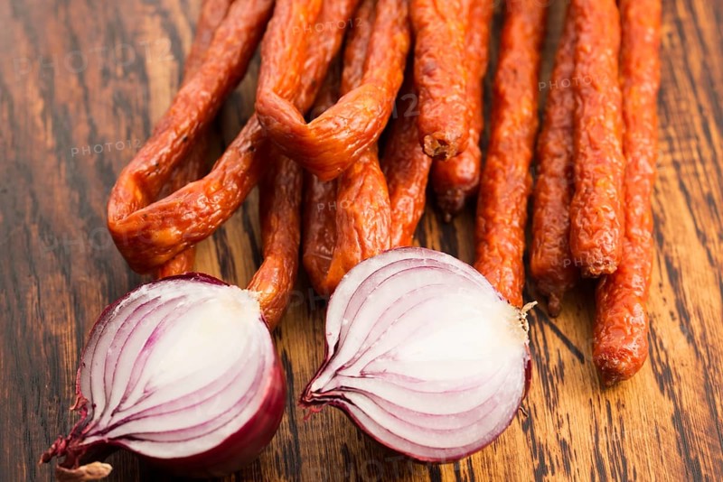 Snack stick sausage with onion