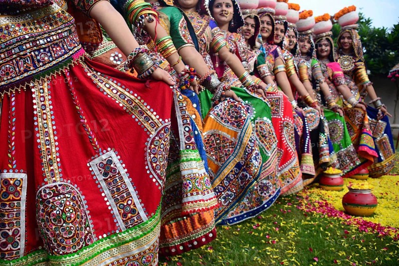Girls in traditional attire, practice the Garba dance steps in preparation for the Navratri festival in Ahmadabad