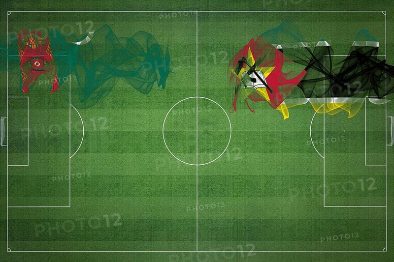 Turkmenistan vs Mozambique Soccer Match, national colors, national flags, soccer field, football game, Competition concept, Copy space
