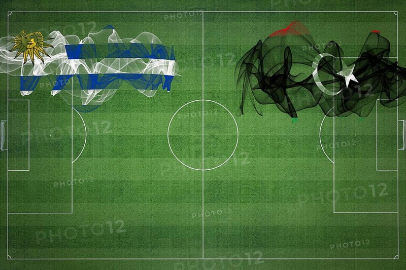 Uruguay vs Libya Soccer Match, national colors, national flags, soccer field, football game, Competition concept, Copy space