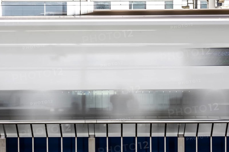 KYOTO, JAPAN - SEPTEMBER 24 2024: A Shinkansen high-speed bullet train arriving at Kyoto Station in Kyoto, Japan, Asia