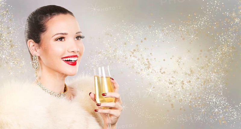 Upscale woman wearing gold jewellery and red lipstick on light background, Toronto, Canada, North America