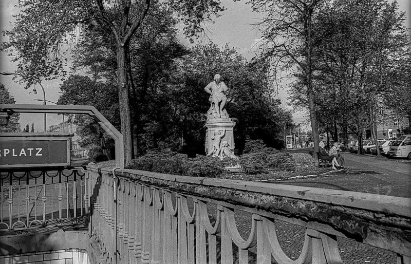 Germany, Berlin, 14 October 1991, Senefelderplatz, with monument to Alois Senefeld, inventor of lithography, Schönhauser Allee, underground station, Europe