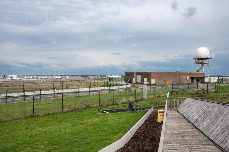 Zaventem, Flemish Brabant Region, Belgium, 09 18 2022, Wooden bench at the observation point for airplane spotting, Europe