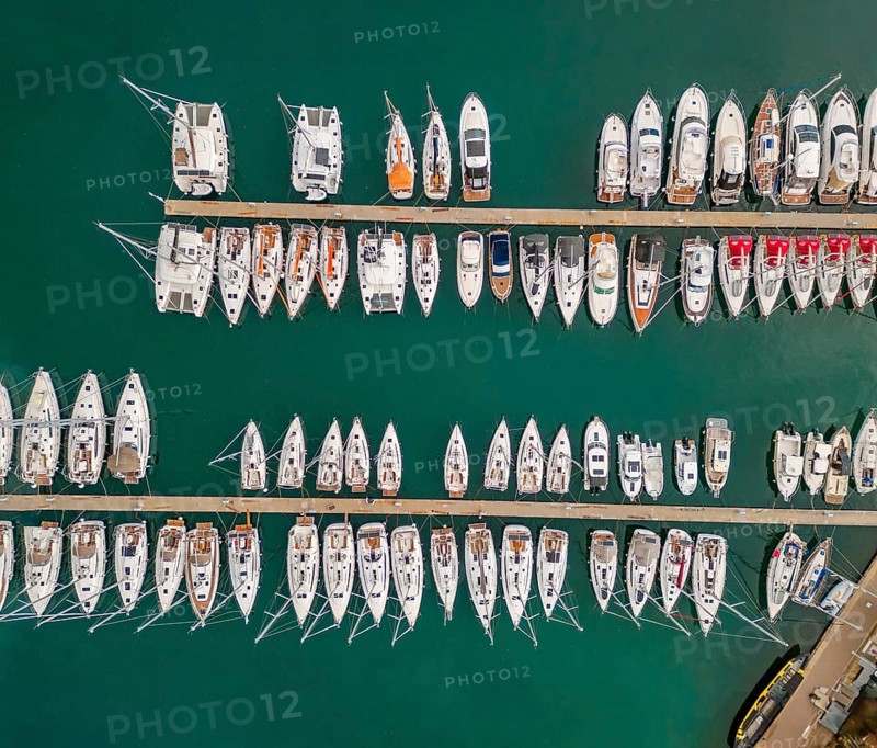 Aerial top view on the luxury yachts and boats in marina