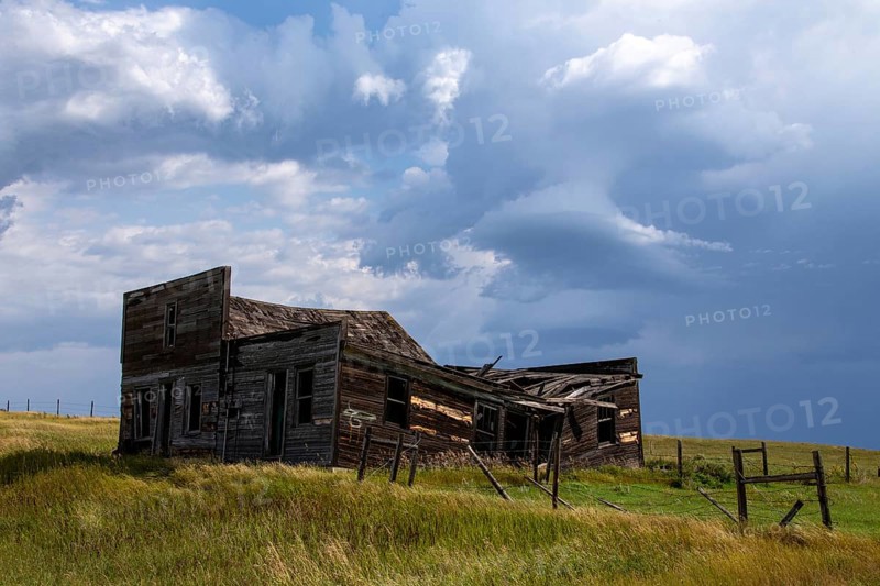 Prairie Storm Canada Summer time clouds abandoned building