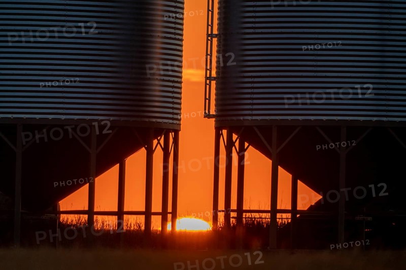 Sunset between the Granaries in Saskatchewan Canada Scenic