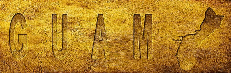 Guam Map and Text on Grunge Gold Texture