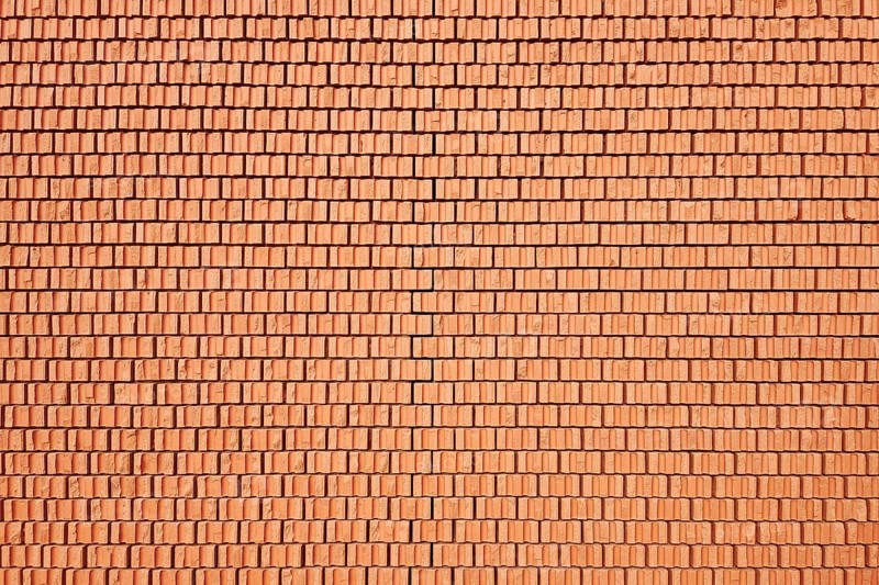 An image of a red brick wall background