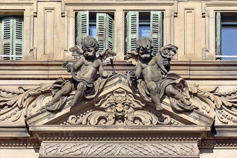House facade with angels