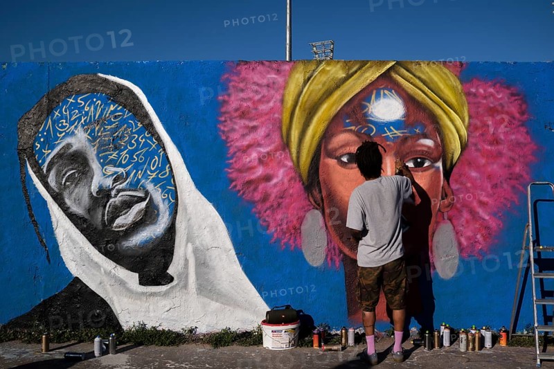 Germany, Berlin, 09.06.2024, Sunday afternoon in Mauerpark, Graffiti Wall (inner wall), Eme Freethinker, at work, Europe